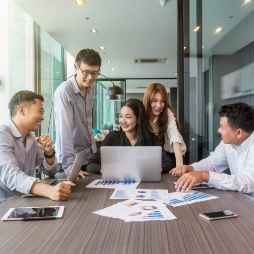 Group Of AsianBusiness people with casual suit working and brainstorming with happy action and celebrate in the modern Office, people business group concept